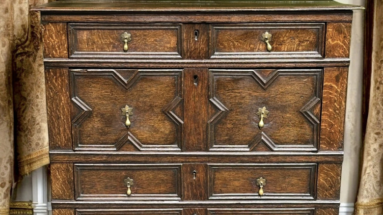Close up of wooden William and Mary chest