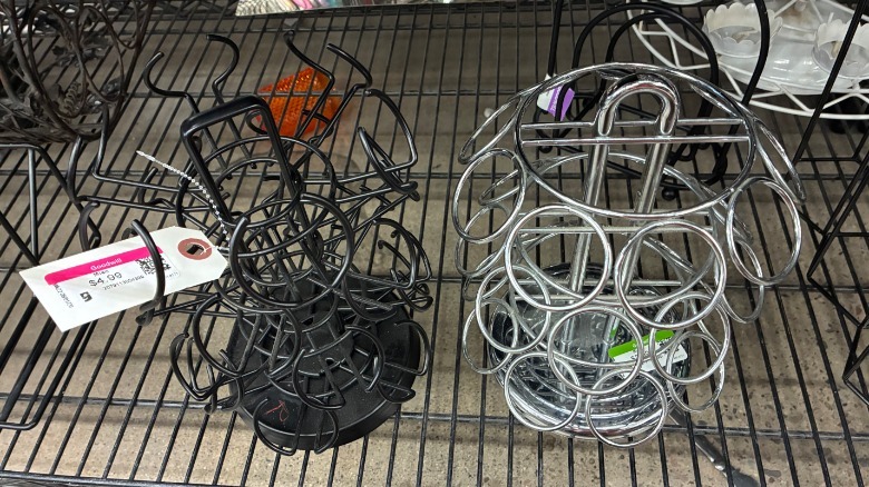 Two coffee pod holders side-by-side on a wire shelf